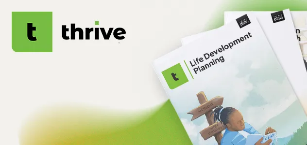The "Thrive" logo with a stack of branded workbooks.